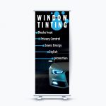 Retractable window tinting banner